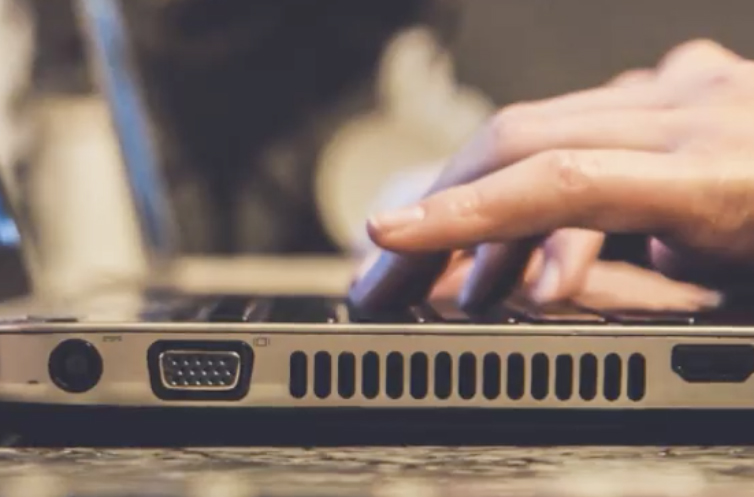 Typing on Laptop