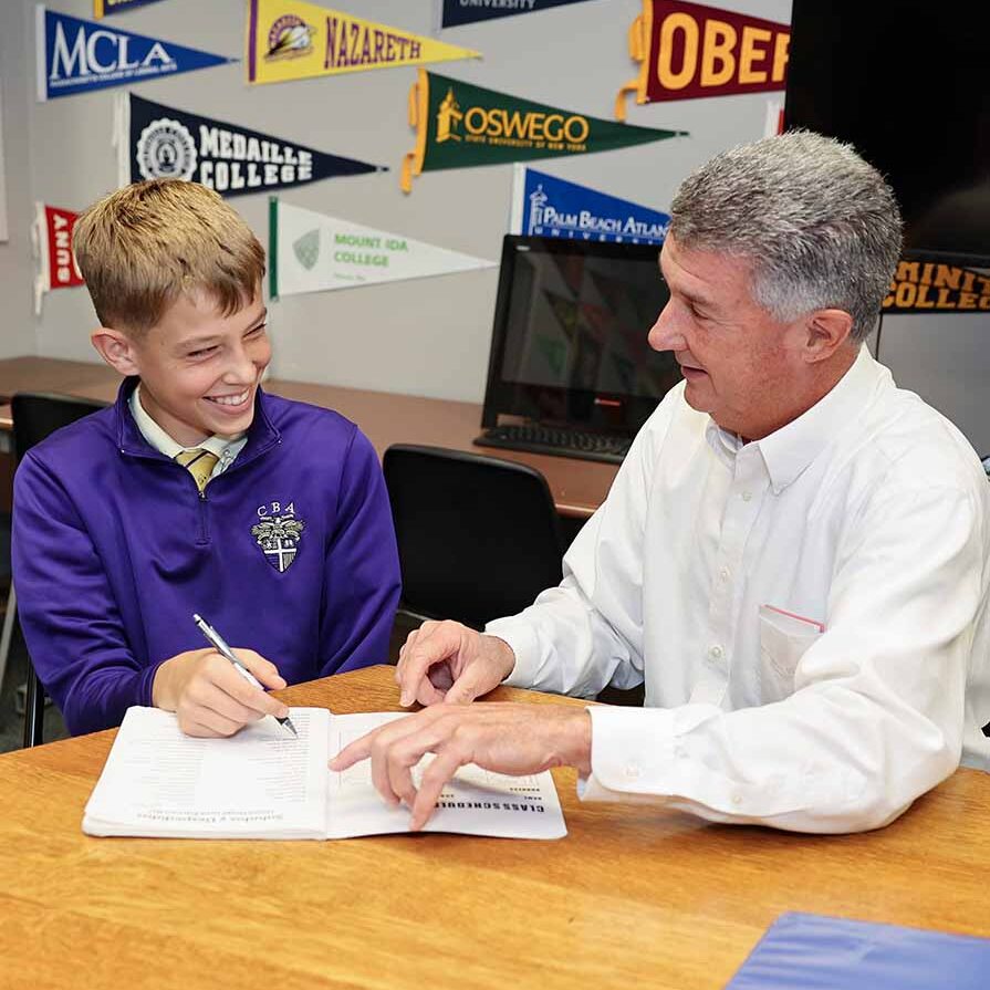 CBA middle school student with guidance counselor